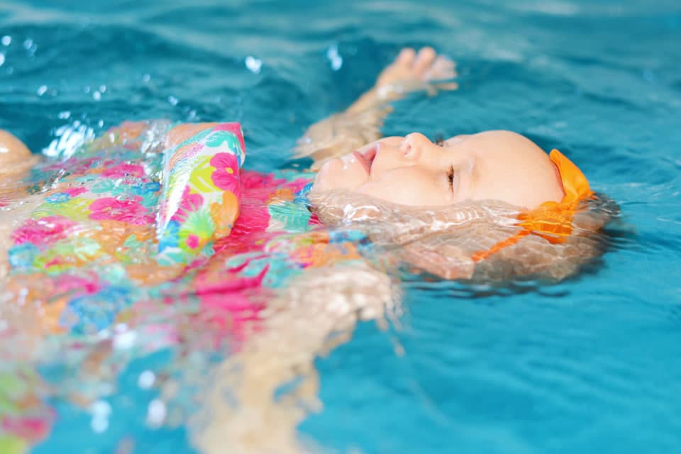 Infant swimming lesson at Aqua Journey Swim School