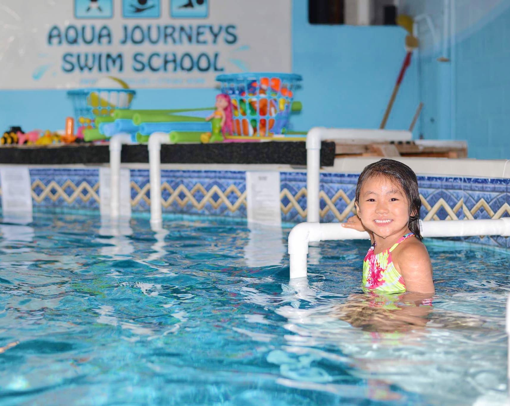 Toddler learning to swim at Aqua Journey